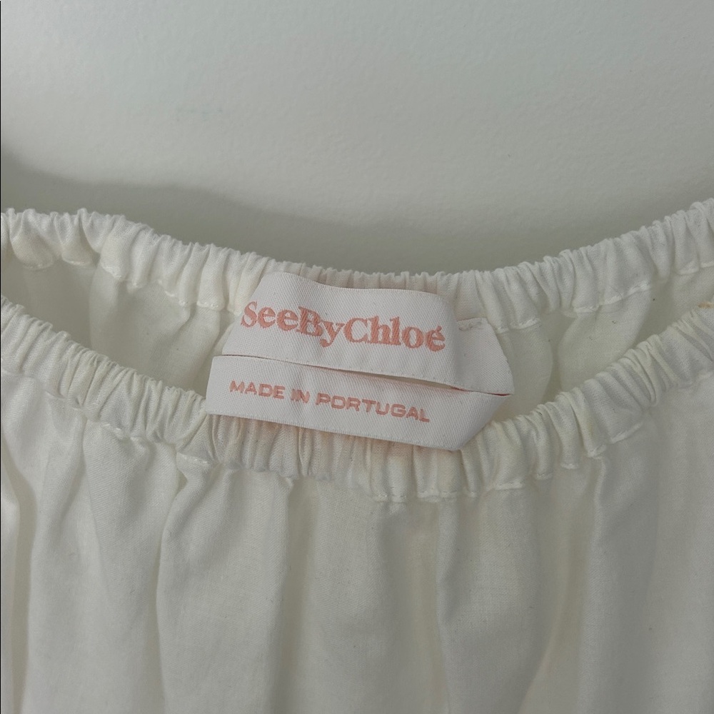 See By Chloe White off Shoulder Top with Light Blue Embroidery - Picture 2 of 5